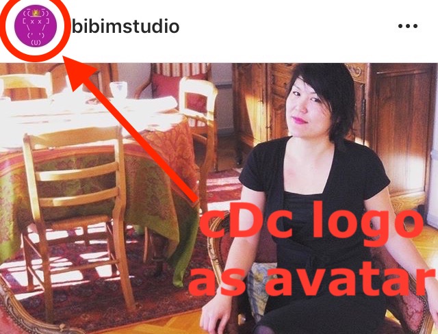 An instagram photo of Caroline Murgue seated in a chair. In the lower-right corner are superimposed the words 'cDc logo as avatar' with a red arrow pointing at the avatar in the upper-left corner. It is indeed the cDc ASCII cow skull logo, on a pink background and decorated with a gold emoji crown.